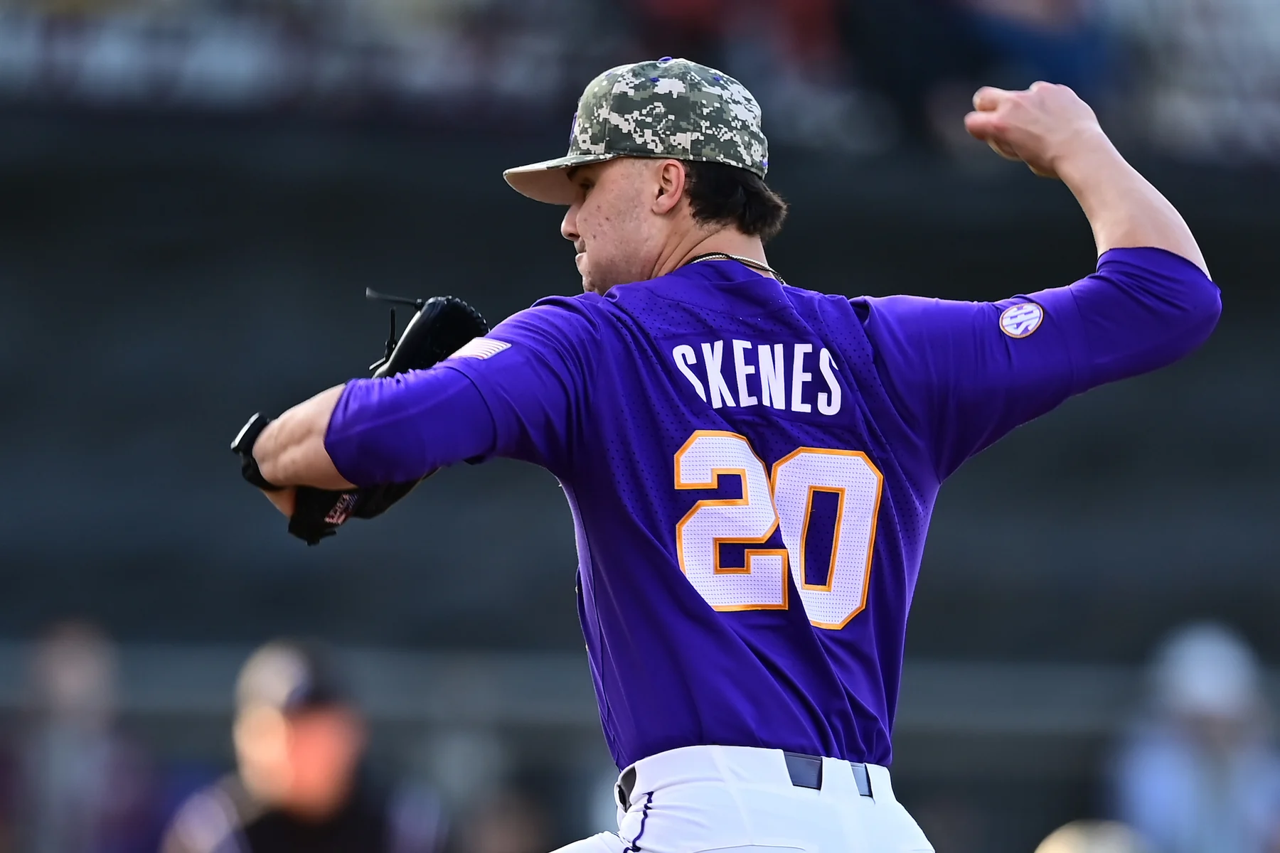 Paul Skenes pitching in LSU's purple number 20 uniform
