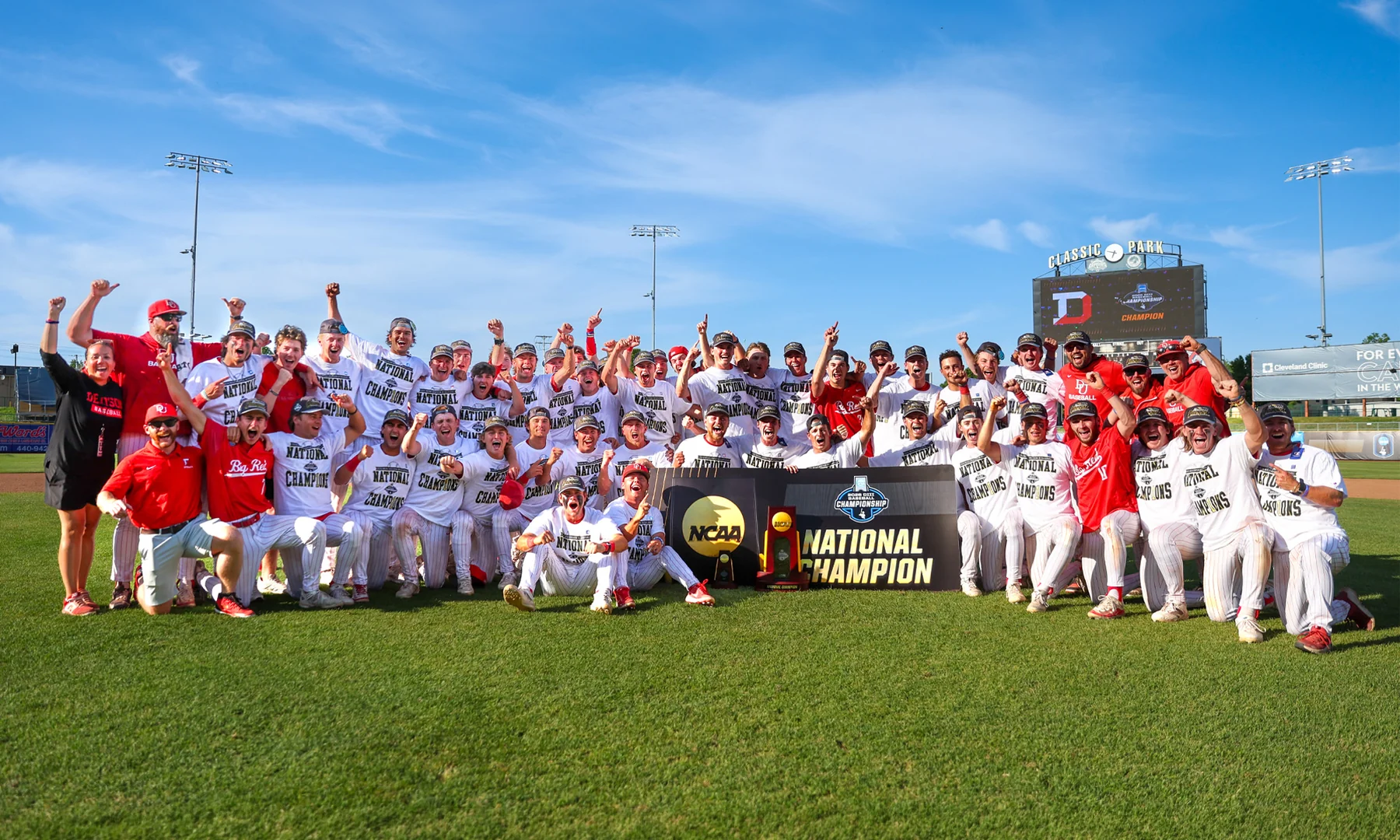 Denison baseball players with their national championship trophy